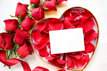 greeting card. bouquet of red roses on a white background and space for text. congratulation. invitation