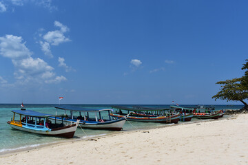 Fototapeta na wymiar boat on the beach. Tanjung Kelayang beach, Belitung, Bangka Belitung, Indonesia,