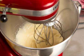 Blender the batter in a metal bowl.