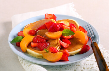 Buttermilk pancakes with strawberry and nectarine topping