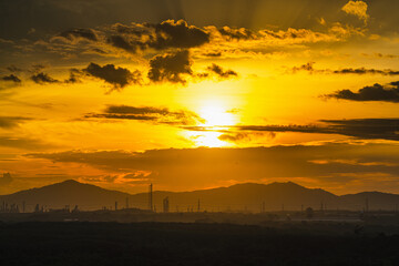 soft focus beautiful sunset scenic view in surrounded mountain unfocused silhouettes landscape with sun light and rays from above range top