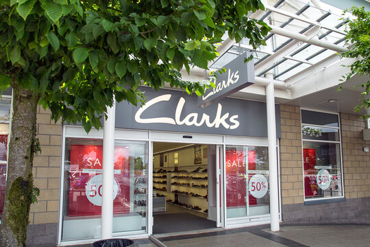 Swansea, UK: July 09, 2017: A Clarks shoe store frontage. Clarks is an international shoe manufacturer based in Somerset, England. Illustrative Editorial
