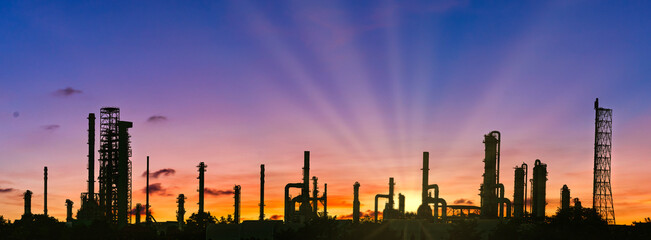 Industrial Estate ,Refinery factory and oil storage tank,petrochemical plant area with beautify sky at sunset