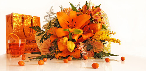Cocktail Spritz with a bouquet of orange flowers and a gift bag. Isolated bouquet of flowers. Macro.