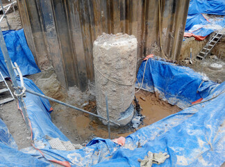 JOHOR, MALAYSIA -MARCH 28, 2016: Excavated and cut to level bore pile at the construction site. Ready to construct a pile cap reinforcement bar as the next step of work. 