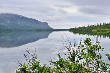 Fototapeta premium Kola Peninsula, Lovozero tundras, Seydozero in cloudy summer day