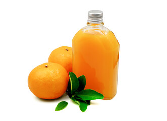Fresh 100% natural Orange juice in flat glass bottle with orange fruits and leaves , isolated on white background , Healthy drink beverage with high vitamin C concept