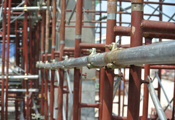 JOHOR, MALAYSIA -JUNE 30, 2016: Scaffolding used as the temporary structure to support platform, form work and structure at the construction site. Also used it as a walking platform for workers. 

