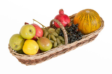 Assortment of fruits in basket isolated on white
