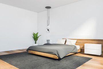 White master bedroom corner with bookshelf