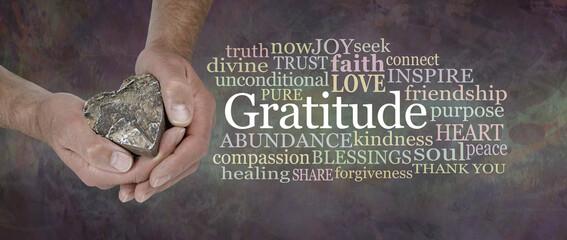 Gratitude from the Heart Word Cloud - male hands gently cupped around a wooden heart beside a ...