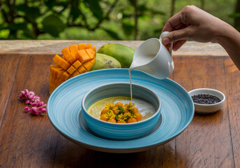 Coconut mango rice pudding. Sticky rice mango asian dessert