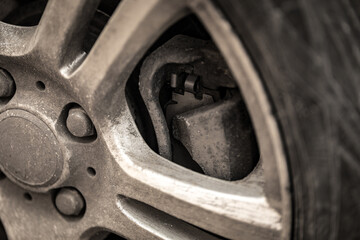 Obraz na płótnie Canvas car wheel brake caliper close-up