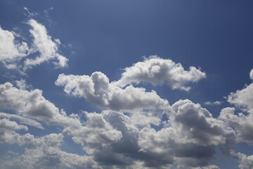 Fototapeta na wymiar white fluffy clouds in the blue sky.