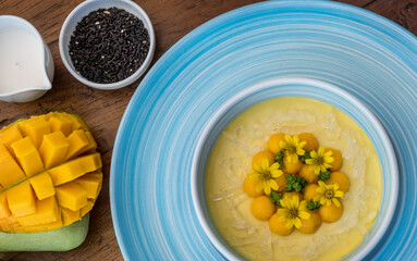 Coconut mango rice pudding. Sticky rice mango asian dessert