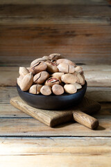Pecan nuts on a wooden table
