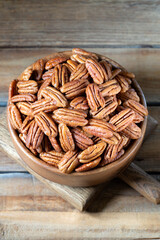 Pecan nuts on a wooden table