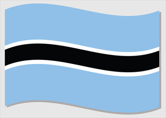 Waving flag of Botswana vector graphic. Waving Batswana flag illustration. Botswana country flag wavin in the wind is a symbol of freedom and independence.