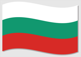 Waving flag of Bulgaria vector graphic. Waving Bulgarian flag illustration. Bulgaria country flag wavin in the wind is a symbol of freedom and independence.