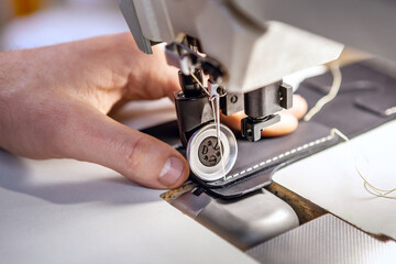 Close up of professional sewing machine for leather work.