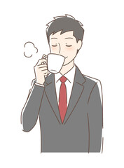 マグカップのコーヒーを飲む男性