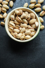 pistachios
Menu concept serving size. food background top view copy space for text
keto or paleo diet
organic healthy eating