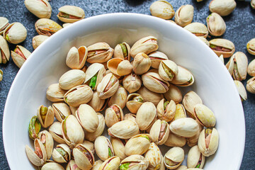 pistachios
Menu concept serving size. food background top view copy space for text
keto or paleo diet
organic healthy eating