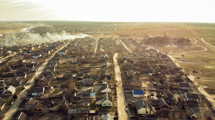 top view of the village: houses, roads, streets. In the background is the horizon. Zarichne village, spring