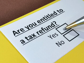 Fototapeta premium One person is answering question about tax refund.