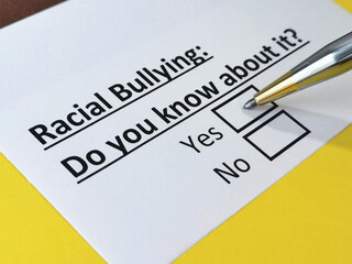 Obraz premium One person is answering question about racial bullying.