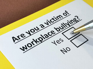 Obraz premium One person is answering question about workplace bullying.