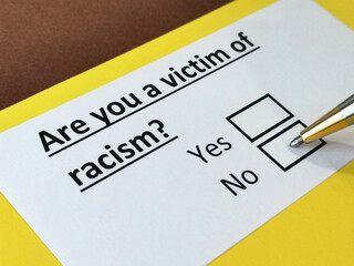 Obraz premium One person is answering question about racism.