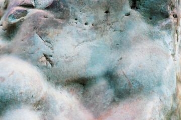 Structure of surface of the stone, used as background. Stone texture. Natural rocks