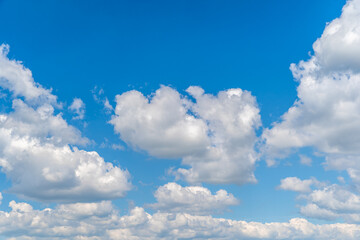 Naklejka na ściany i meble blue sky with white clouds in sunny weather