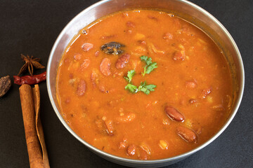 Rajma or Razma is a popular vegetarian dish, originating from the Indian subcontinent, consisting of red kidney beans in a thick gravy