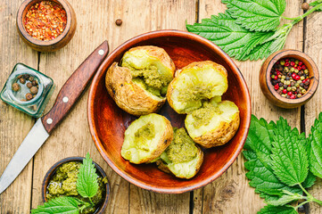 Home baked potato with greens.
