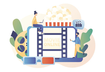 Online cinema concept. Home movie theater. Cinematography. Tiny people watching movie with popcorn,3d glasses and video attributes. Modern flat cartoon style. Vector illustration on white background