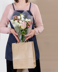 Worker flower pink delivery service packing bag box apron packer shipping open online