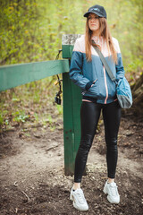 young sexy girl walks in nature