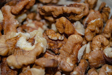 Peeled walnuts close-up. Surface texture. Healthy diet.