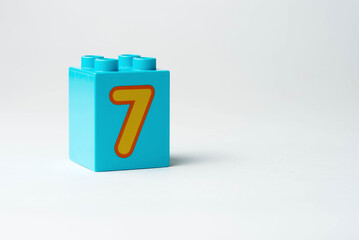 the number seven written on the block from the children's constructor