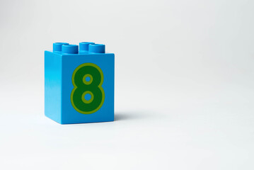 the number eight written on the block from the children's constructor