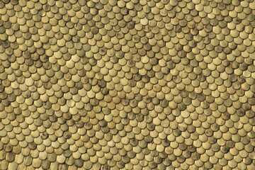 Fototapeta premium Aerial closeup view of tiles on Golden Roof (Goldenes Dachl) taken from the top of City Tower (Stadtturm, 51 meters). Golden Roof has 2,738 fire-gilded copper tiles.