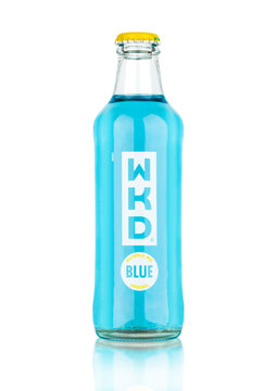 LONDON, UK - APRIL 15, 2019: Bottle of WKD blue original alcoholic mix drink on white background.