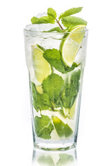 A glass of Mojito with lemon and mint