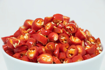 Sliced ​​red peppers in cup