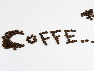 Coffe word lined with coffee beans