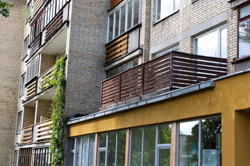 Naklejka premium Fragment of one of the serial high-rise apartment buildings.