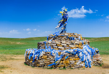 Ovoo, traditional Mongolian monument worshiping the cult of mountains and sky, usually in the shape of a pile of stones built in mountains and steppes of Mongolia
