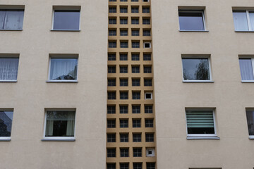 Fototapeta na wymiar Fragment of the facade of a residential city building.